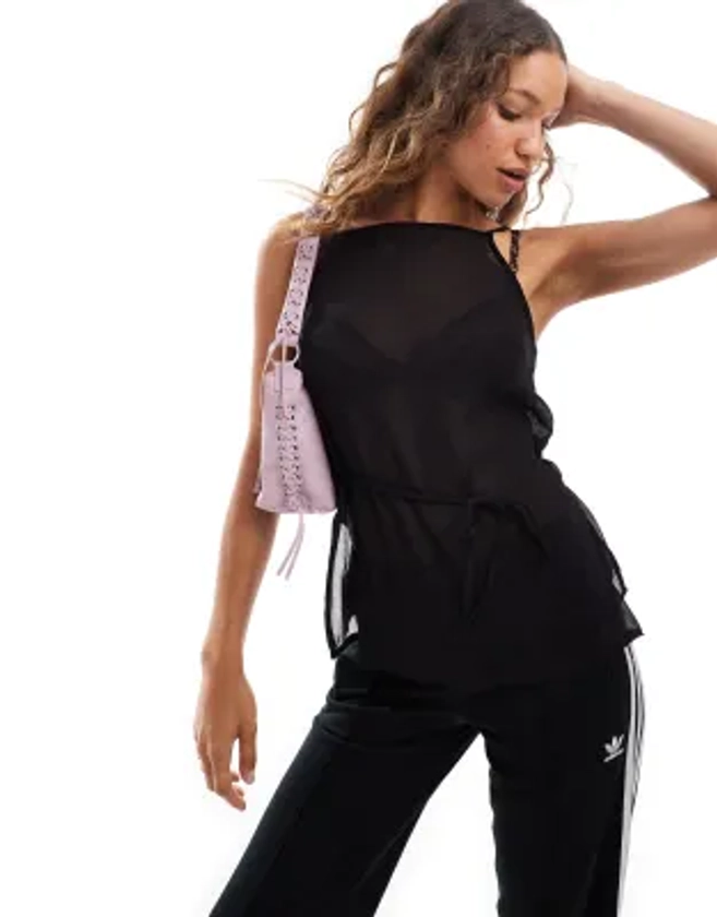 Monki - Top transparent à bretelles avec fente profonde et liens noués dans le dos - Noir | ASOS