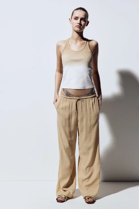 Pantalon en crêpe avec taille élastique - Beige - FEMME | H&M FR