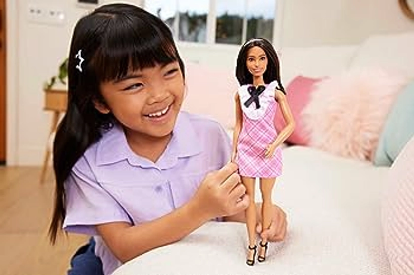 Barbie Fashionistas Doll #209 with Black Hair Wearing a Pink Plaid Dress, Pearlescent Headband and Strappy Heels, HJT06