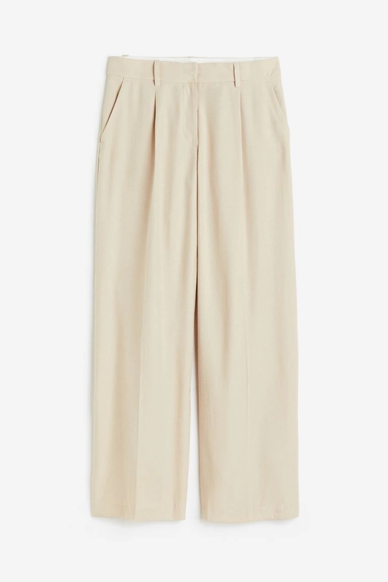 Tailored trousers - Low waist - Long - Light beige - Ladies | H&M GB