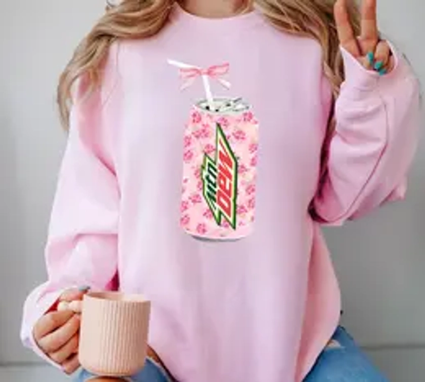 Coquette Mtn Dew Sweatshirt, Floral Mtn Dew Shirt, Cute Baby Pink Bow Tee, Coquette Pink Bow Tee, mtn dew shirt, Trendy Soda Can With Roses, Fun Mtn Dew Lover Gift