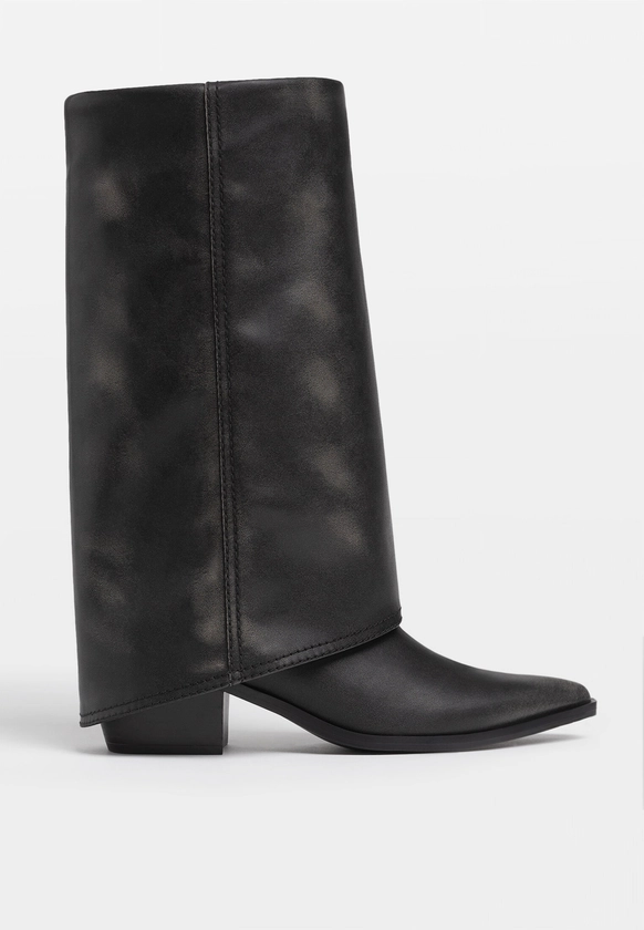 Bottes à talon noires avec pantalon à pied - Toutes femme | Stradivarius France