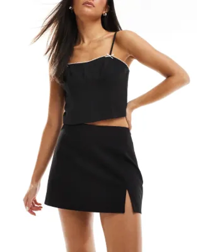 Stradivarius 90s mini skort in black | ASOS