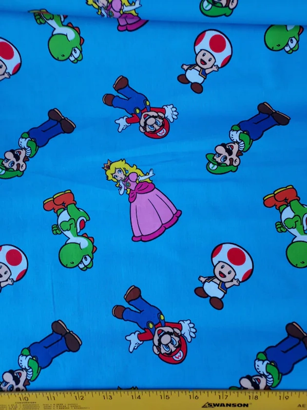 New! Springs Super Mario  ,cast Toss,100% cotton for clothing ,crafts and quilting ,doll clothes,B.T.Y. 1/2,1/4,fat quarter