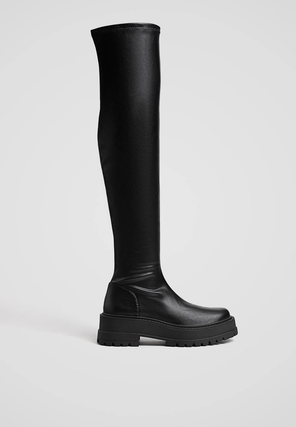 Bottes plates XL noires à semelle crantée - Toutes femme | Stradivarius France