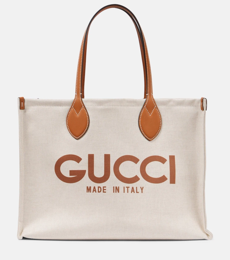 Logo leather-trimmed canvas tote bag in beige - Gucci | Mytheresa
