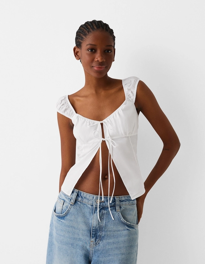 Cropped shirt with tied detail