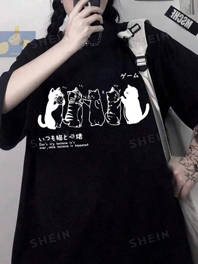 SHEIN EZwear Camiseta De Manga Corta Floja De Impresión De Gato De Dibujos Animados Para Mujer Con Lema
