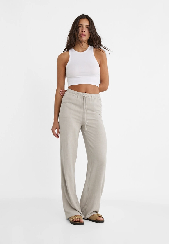 Pantalon fluide avec lin - Mode femme | Stradivarius France