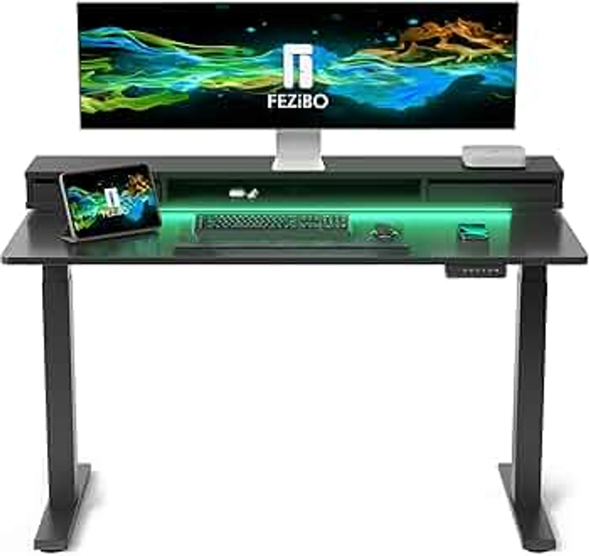 FEZIBO 140 * 60cm Electric Standing Desk with Monitor Stand, Height Adjustable Table with LED Strips, Ergonomic Home Office Furniture with 2 Drawers Storage Gaming Workstation, Black Carbon Fiber