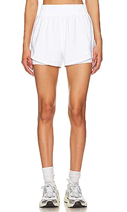 Nike One Dri-FIT High Waisted 2 in 1 Shorts in White & Reflective Silver from Revolve.com
