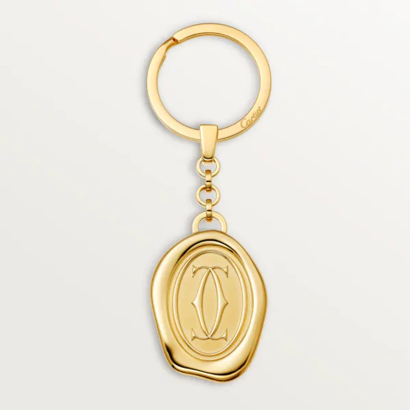 Key ring Logótipo Double C: Key ring with golden-finish wax seal motif. Medallion dimensions: 34.4mm high x 26 mm wide