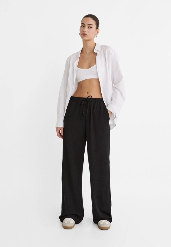 Pantalon fluide avec lin - Pantalons femme | Stradivarius France