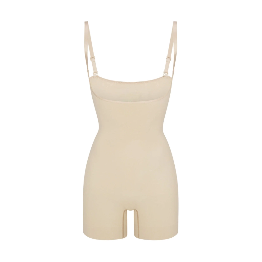 SEAMLESS SCULPT OPEN BUST SHORTIE BODYSUIT | SAND