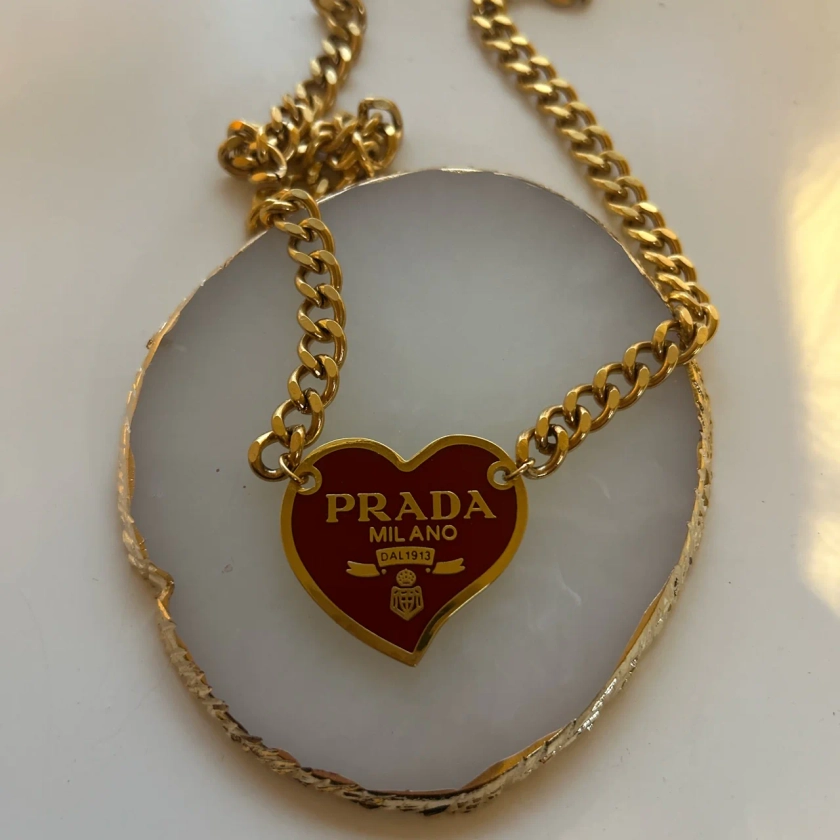 PRADA RED HEART NECKLACE (GOLD)