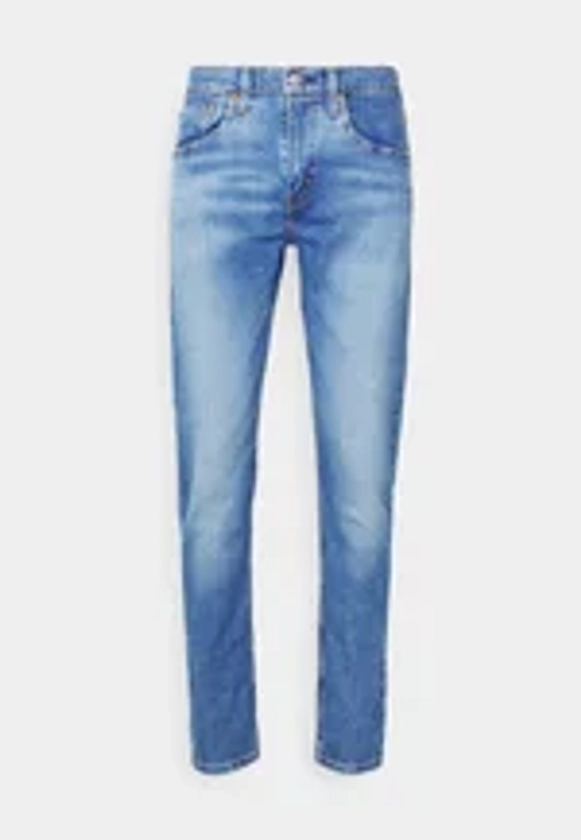 512™ SLIM TAPER LO BALL - Jeans fuselé - light-blue denim