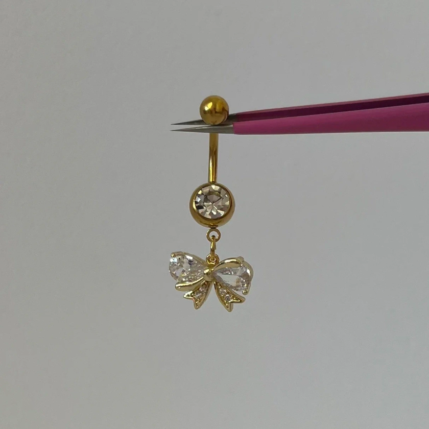 Gold Bow Belly Bar