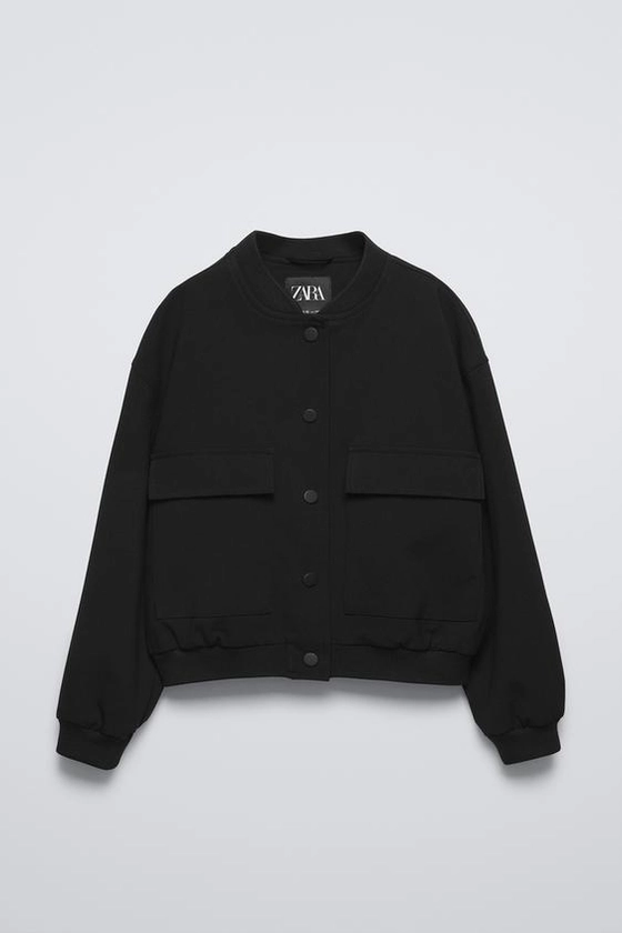 BOMBER JACKET WITH POCKETS