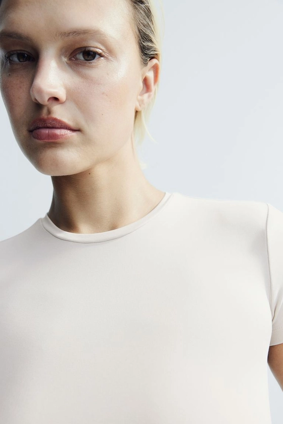 T-shirt ajusté en microfibre - Beige clair - FEMME | H&M CH