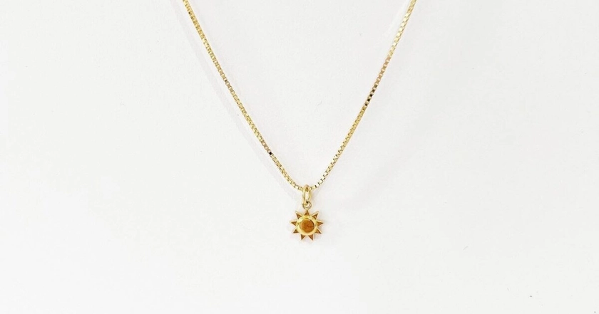 Tiny sun necklace