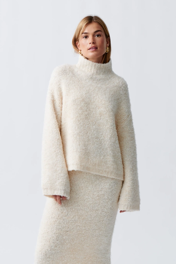 Knitted boucle sweater