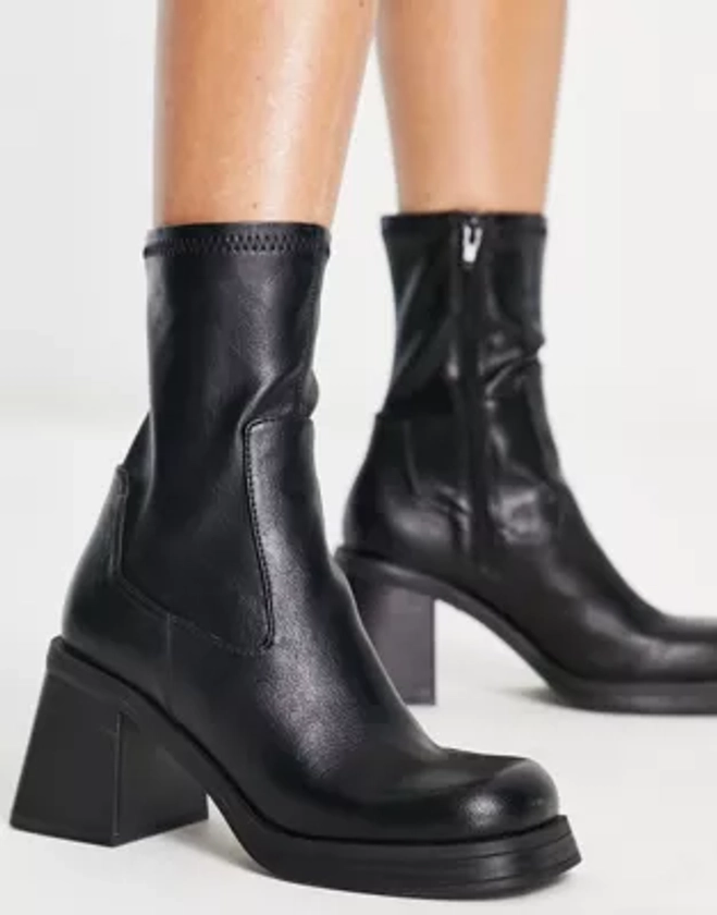 ASOS DESIGN Reversed mid-heel sock boots in black | ASOS
