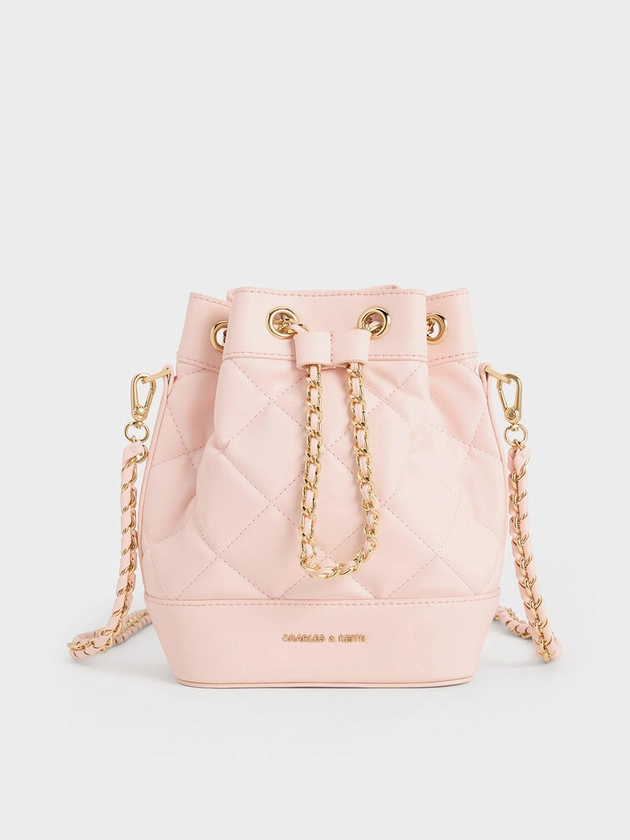 Sac seau multi-port matelassé    
         - Rose clair