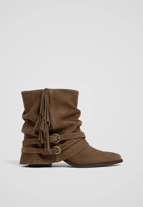 Bottines de cowboy en cuir avec franges