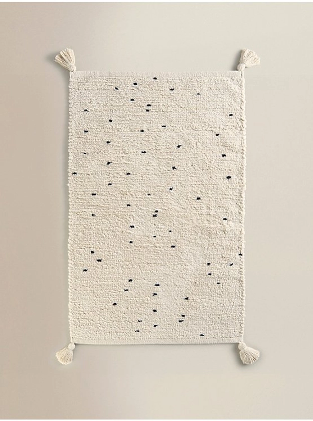 Primitive Essence Cream & Black Speckle Bath Mat