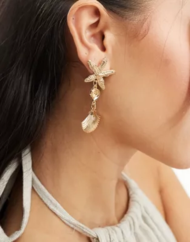 Kaiia starfish and shell drop earrings in gold | ASOS