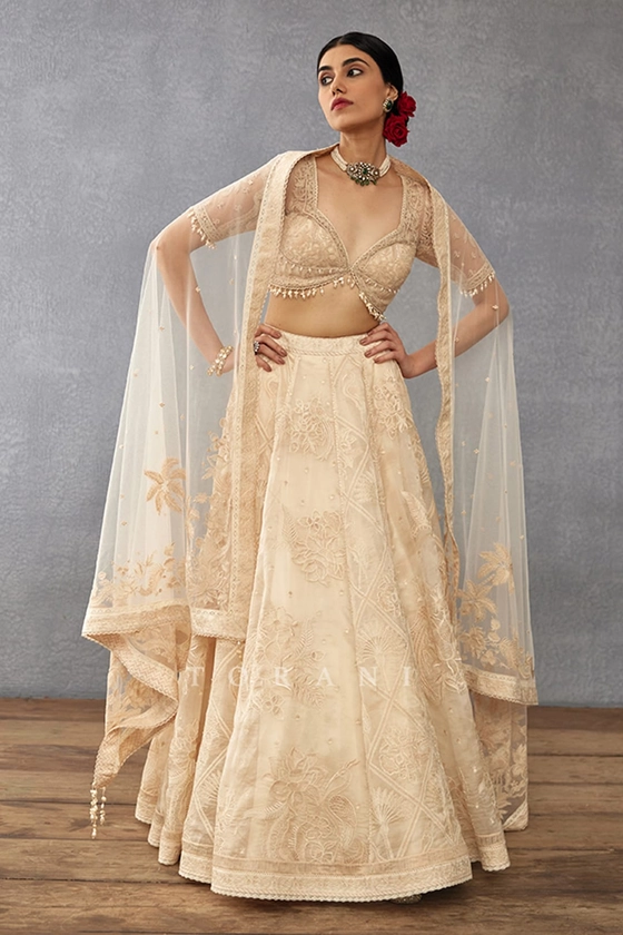 Buy Beige Silk Organza Hand Mradu Pankhuri Botanic Pattern Bridal Lehenga Set For Women by Torani Online at Aza Fashions.