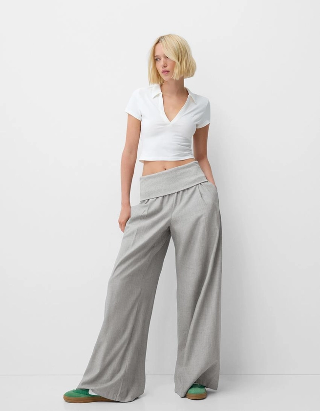 Wide-leg trousers with fold-over waist - Women