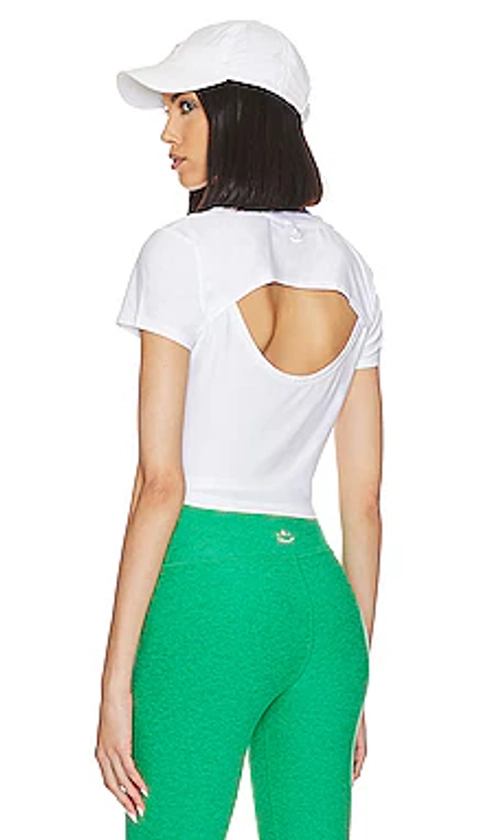 Beyond Yoga Featherweight Cropped Open Back Tee in Cloud White from Revolve.com