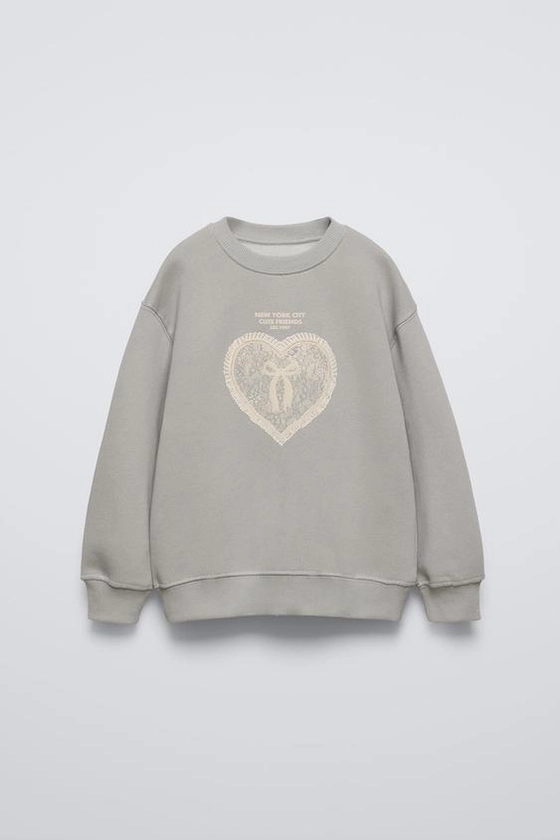 RAISED HEART SWEATSHIRT