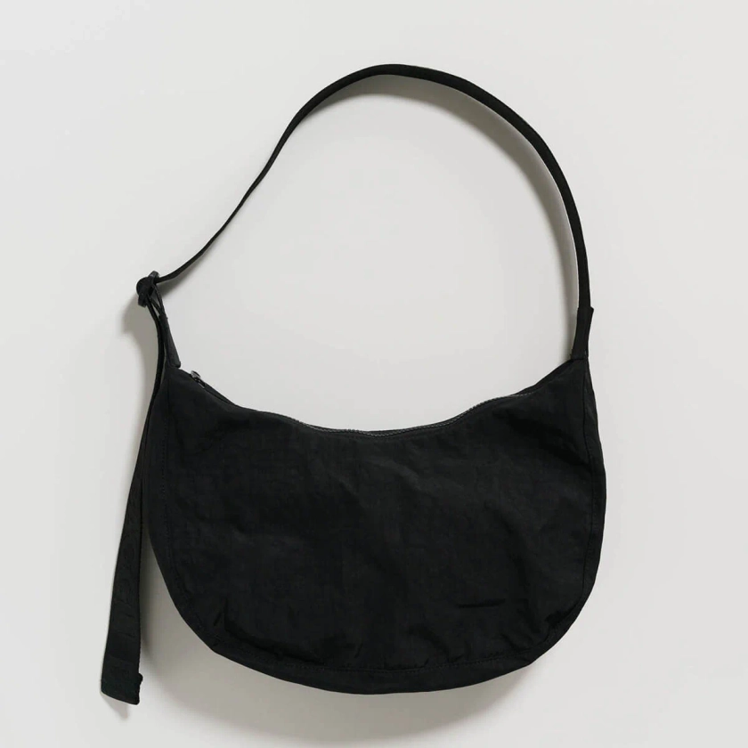 Medium Nylon Crescent Bag in Black by Baggu