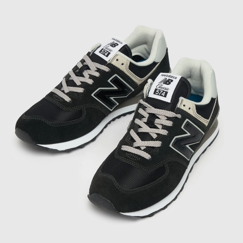 New Balance574 trainers in black & white
