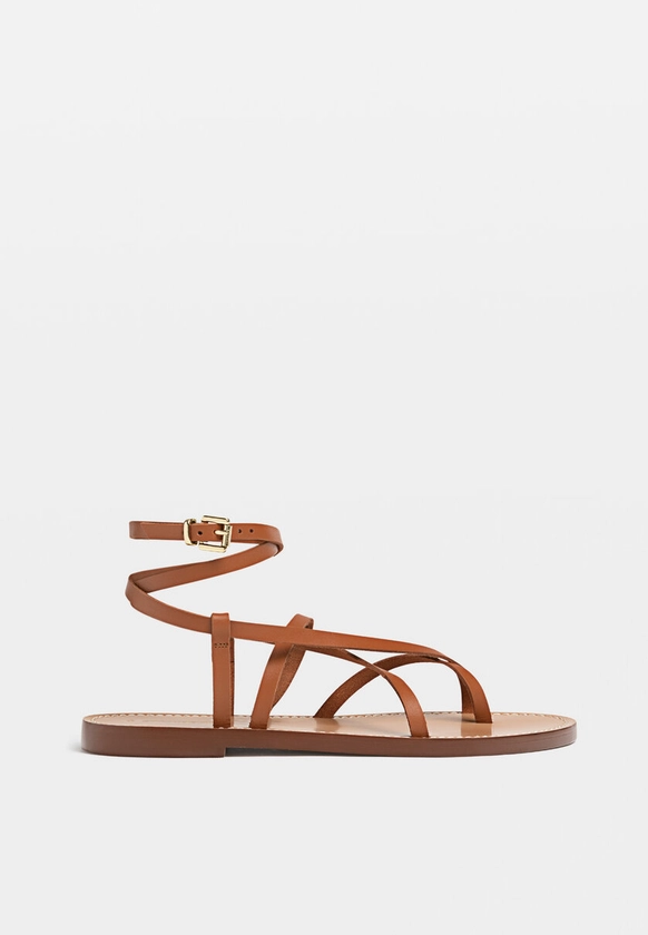 Flat strappy leather sandals