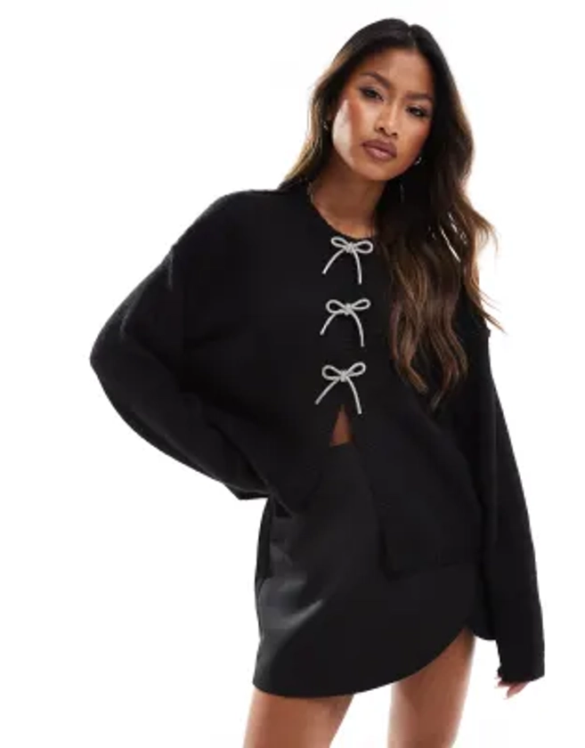 ASOS DESIGN v neck oversized cardigan with diamante bow buttons in black | ASOS