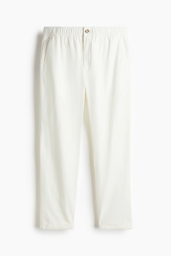 Regular Fit Linen-blend trousers - Regular waist - Long - White - Men | H&M GB