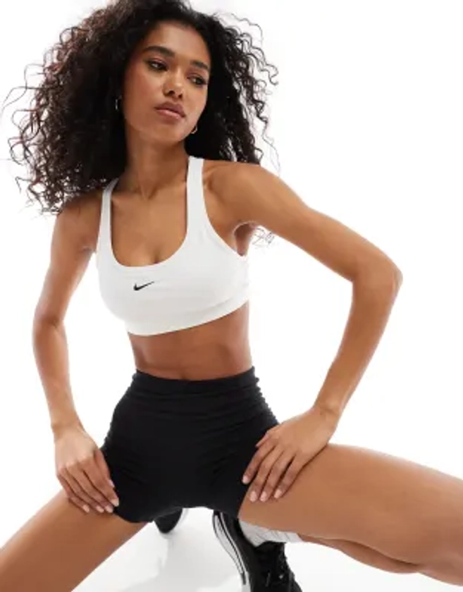 Nike Training Swoosh light support sports bra in white