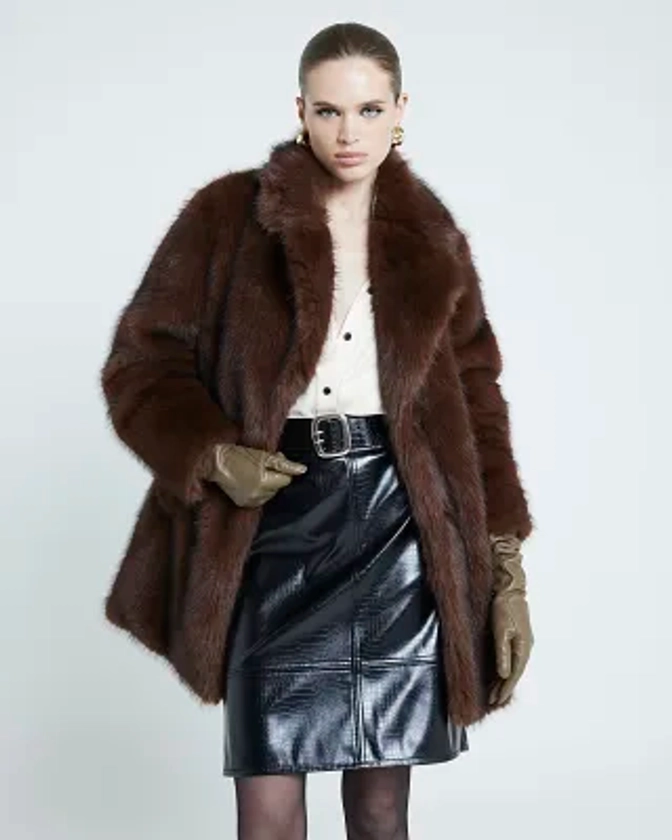 Dark brown mid length faux fur coat