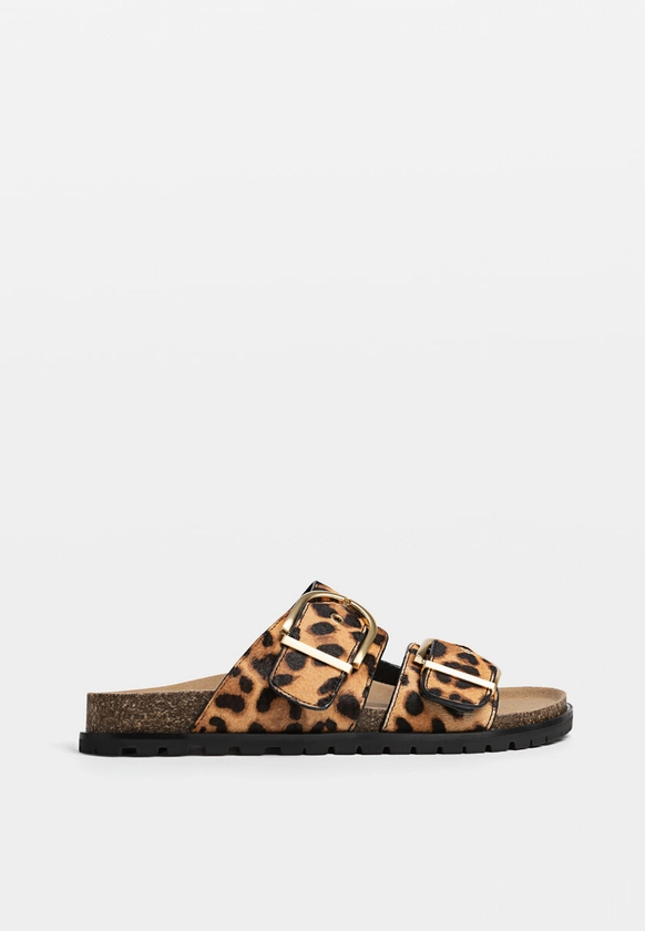 Sandales plates en cuir imprimé léopard