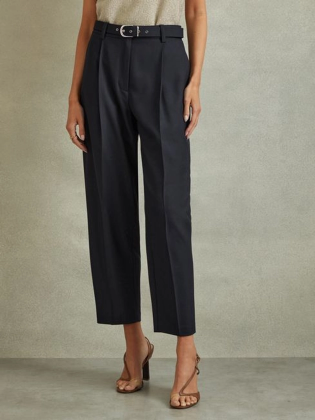 Petite Tapered Belted Trousers in Navy - REISS