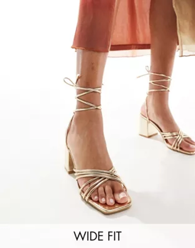 Truffle Collection wide fit block heel strappy sandal in gold | ASOS