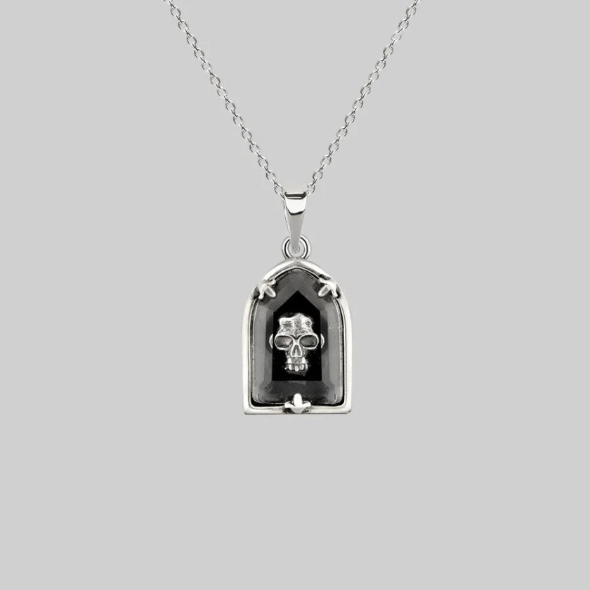 OMINOUS. Skull Under Glass Necklace - Silver