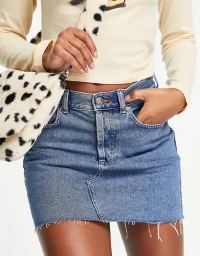 ASOS DESIGN - Mini-jupe à taille mi-haute en denim authentique - Délavage moyen | ASOS