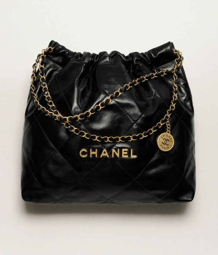 Chanel 22 handbag, Metallic calfskin & silver-tone metal, silver — Fashion | CHANEL