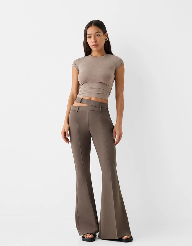 Flared cut-out trousers