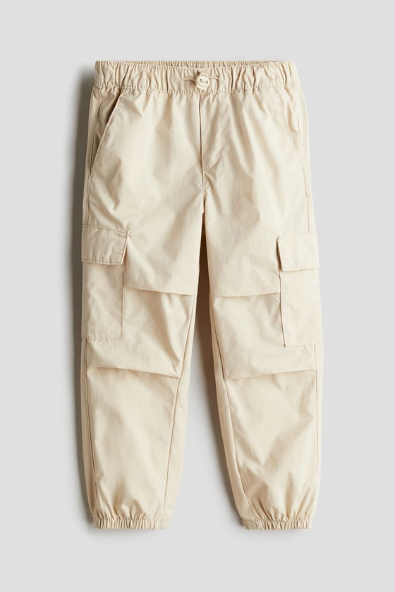 Cotton Cargo Pants - Regular waist - Regular length - Light beige - Kids | H&M US