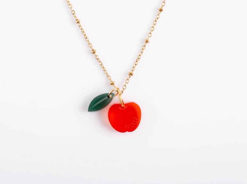 Necklace with red apple and leaf pendant